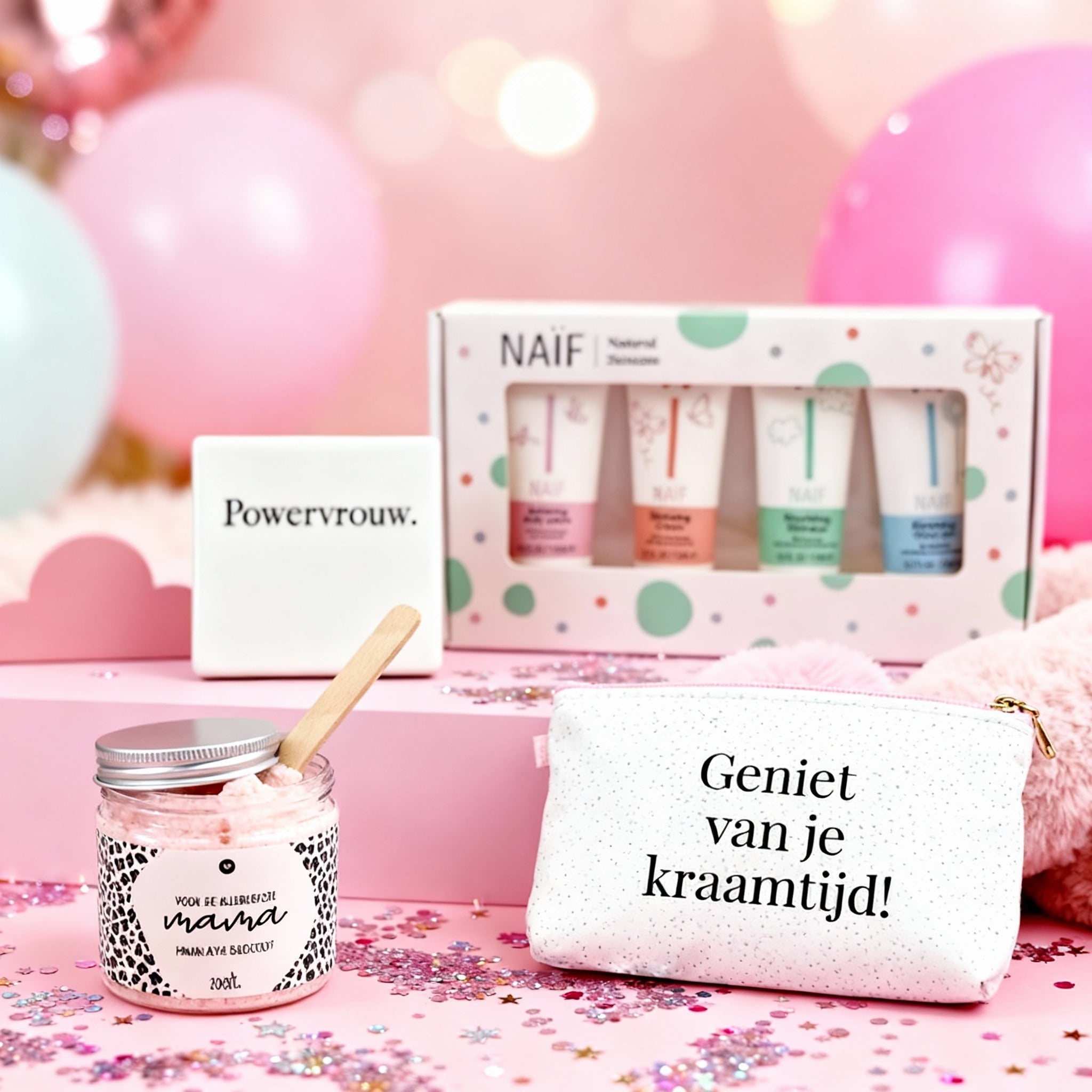babycadeautjes in de vorm van badzout voor de mama, een tasje met de tekst geniet van je kraamtijd en verzorgingsproducten voor de baby