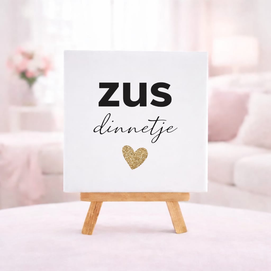 wit keramiek tegeltje met de tekst zusdinnetje en een goud hartje