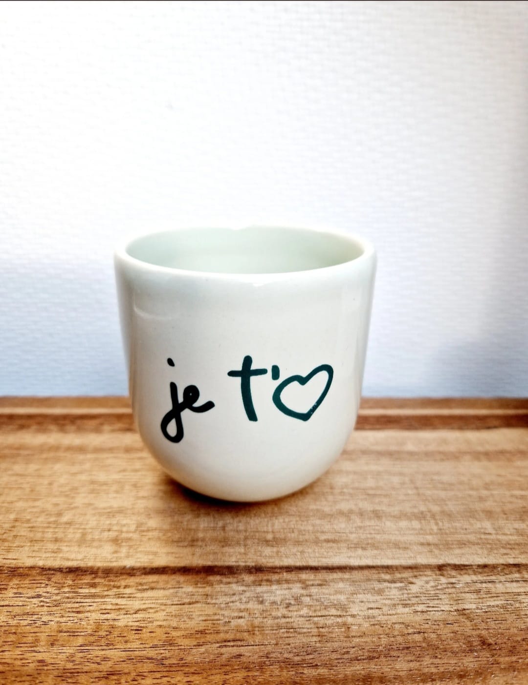 groene mok met de tekst je t'aime
