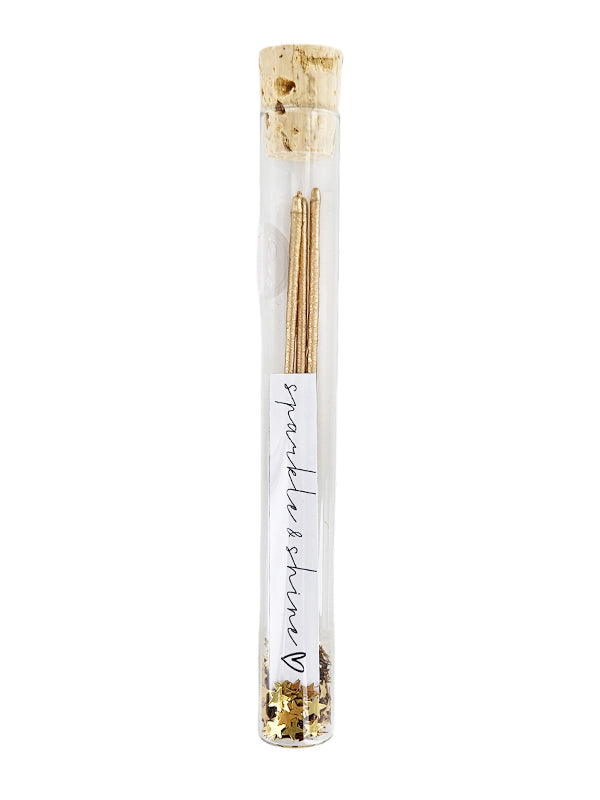 glazen wensbuisje met sterretjes en de tekst sparkle and shine