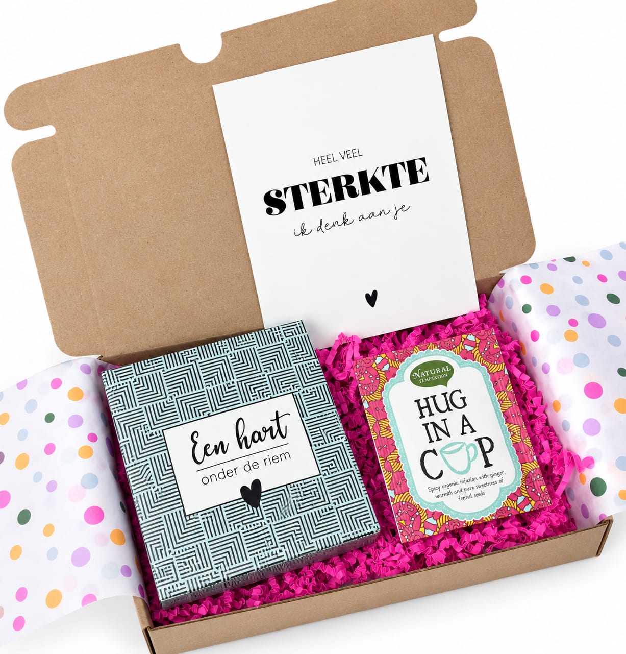 Eetbare groeibloemen met de tekst 'een hart onder de riem', Wenskaart 'Heel veel sterkte' en een 'Hug in a cup' theezakje