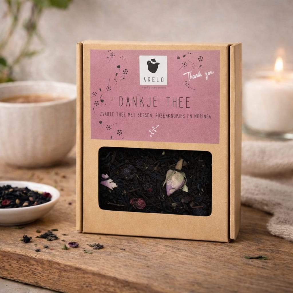 bruin doosje met losse thee en de tekst dank je thee