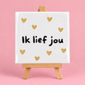 Witte keramieken tegel met de tekst ik lief jou
