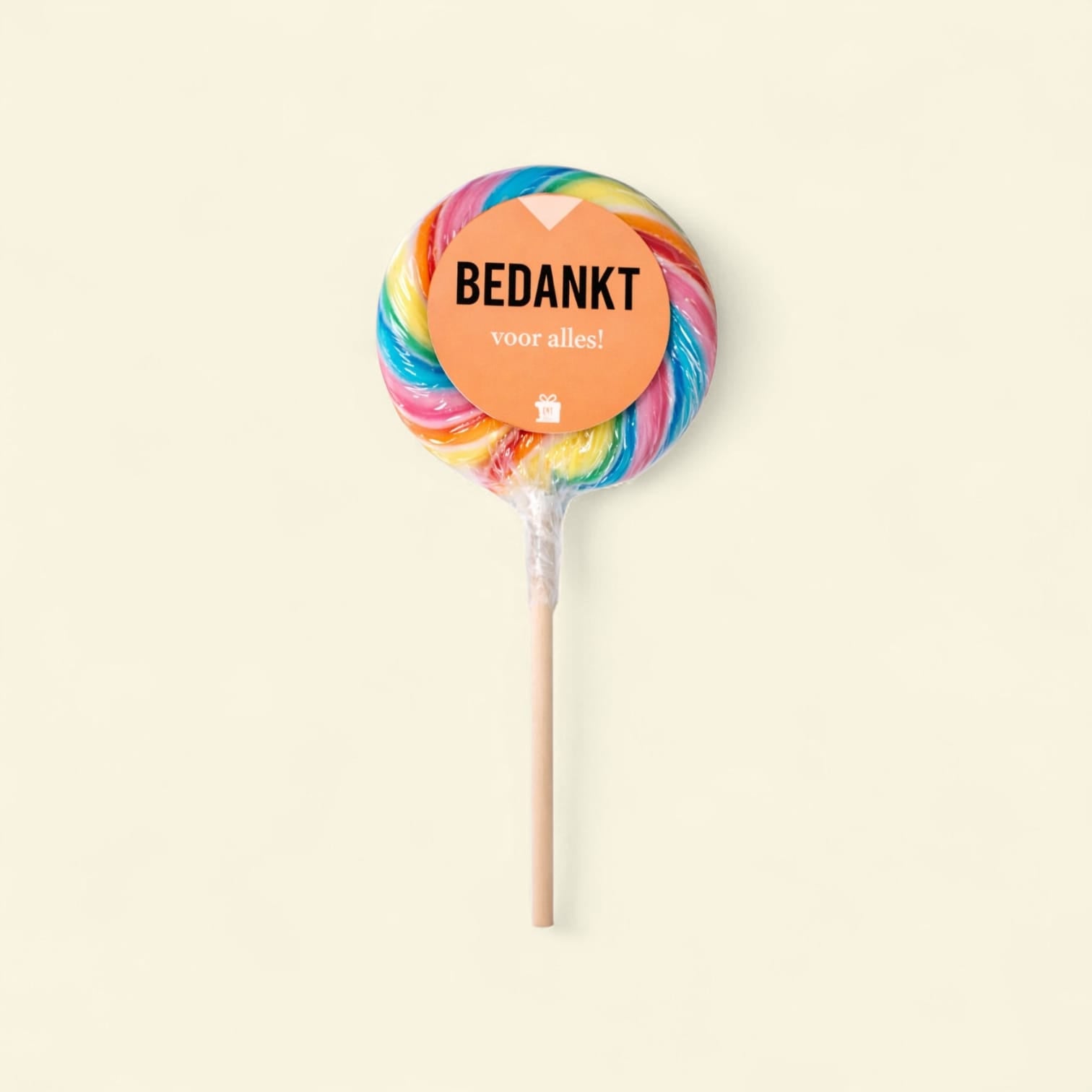 Ronde regenboog lolly met de tekst bedankt voor alles!