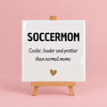 Witte keramieken tegel met de tekst soccermom